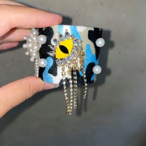 Bracciale rigido in tessuto con perle e strass Blanc Mariclò